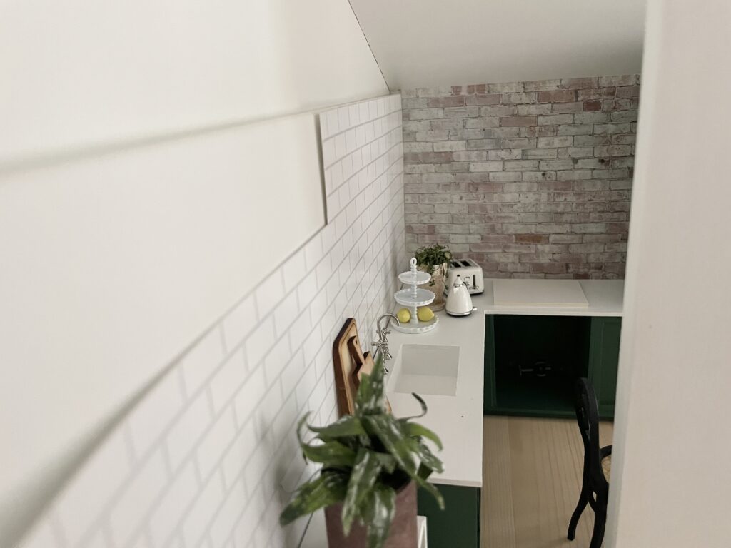 Green dollhouse kitchen with tiles